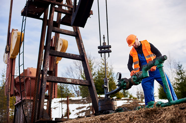 A Walters Well Drilling LLC technician installing a high-efficiency submersible water pump into a residential well casing in South Central Pennsylvania.