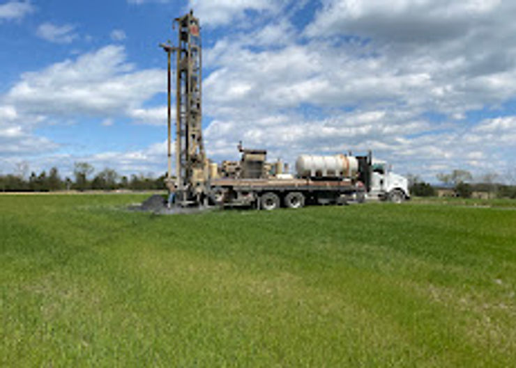 A Walters Well Drilling LLC professional drill rig performing a deep-bore vertical loop installation for a residential geothermal heating and cooling system in South Central Pennsylvania.